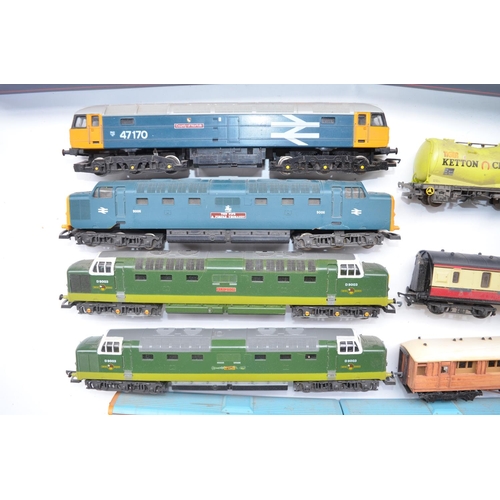 393 - Collection of previously used OO gauge train models to include 4 unboxed Hornby diesel locos (all fa... 