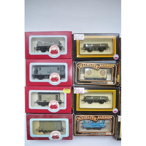 394 - Collection of boxed Dapol OO gauge goods wagons and a D14 Class 56 Railfreight diesel locomotive 