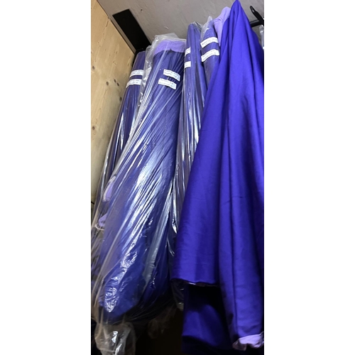 1182 - Large quantity of reversible purple capes, approx. 24