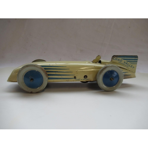 411 - Chad Valley Harborne cream and blue tinplate clockwork Racing or Land Speed Record car, and a Wells ... 