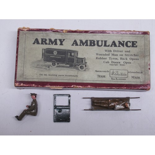 402 - W. Britain military model No. 1512 Army Ambulance with Driver and Wounded Man on Stretcher, in origi... 