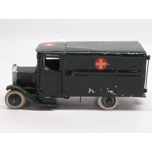 402 - W. Britain military model No. 1512 Army Ambulance with Driver and Wounded Man on Stretcher, in origi... 