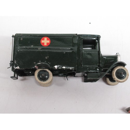 402 - W. Britain military model No. 1512 Army Ambulance with Driver and Wounded Man on Stretcher, in origi... 