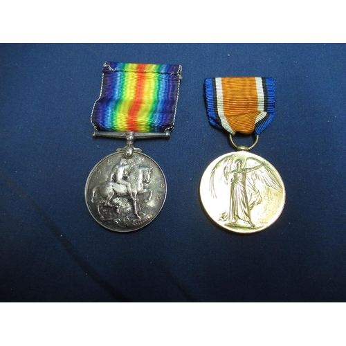 873 - WWI Victory medal and British war medal 1914 - 1918 awarded to 2883 Cpl. H Robinson West Yorkshire r... 