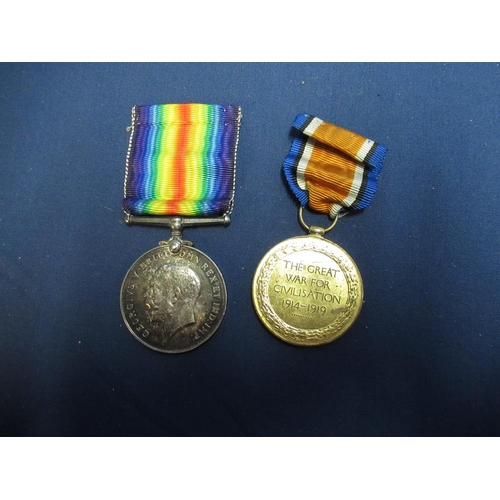 873 - WWI Victory medal and British war medal 1914 - 1918 awarded to 2883 Cpl. H Robinson West Yorkshire r... 