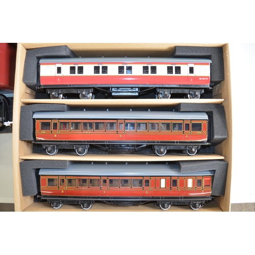 251 - Boxed Darstaed O gauge LMS and mixed SC railway 3 carriage tin plate set, crimson and cream 1st clas... 