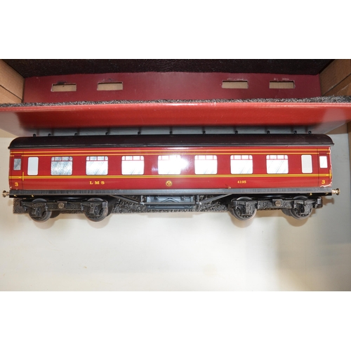 251 - Boxed Darstaed O gauge LMS and mixed SC railway 3 carriage tin plate set, crimson and cream 1st clas... 