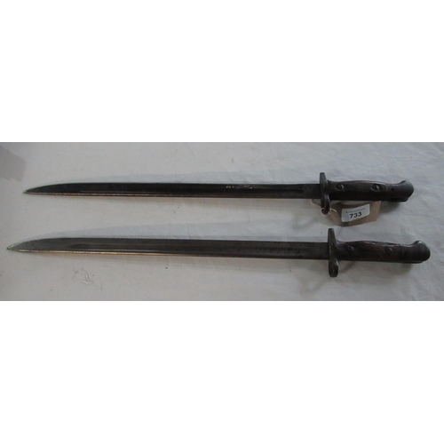 733 - Two 1907 pattern SMLE (Short Magazine Lee Enfield) rifle bayonets. One with clear markings on blade ... 