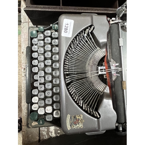 1280 - Imperial 'The Good Companion' typewriter, and a vintage cash register (2)