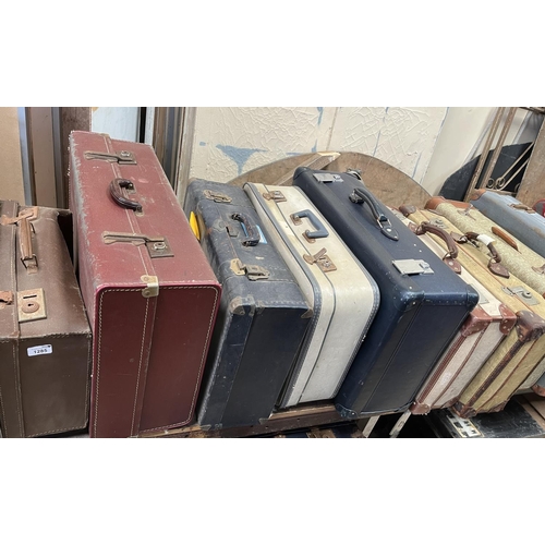 1285 - Vintage suitcases, including two military type cases (10)