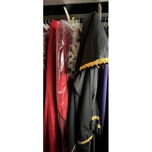 1085C - Pantomime villain outfits, including capes and tunics, approx.10