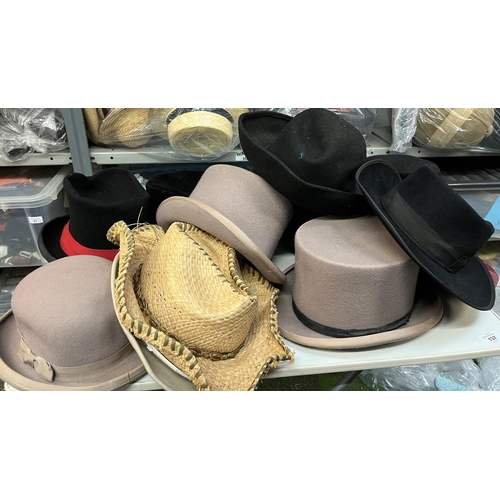 137 - Large quantity of hats in various styles inc. trilby, fedora, bowler, etc. (2 bags)