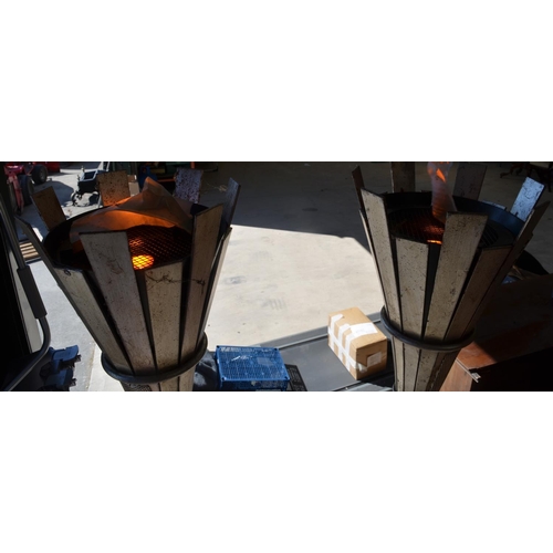 1100 - Two mains powered pub style outdoor lights with simulated flame (H193.5cm approx) and 6 citronella/c... 