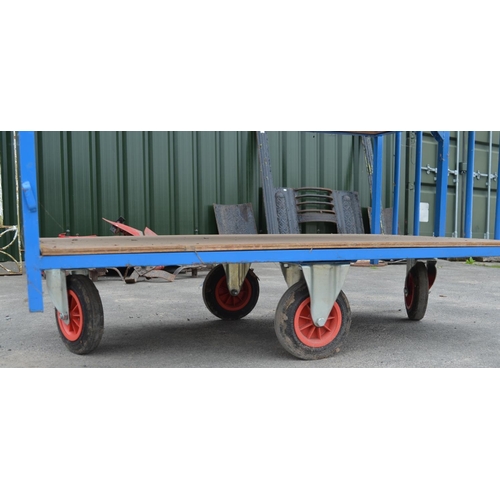 1117 - Four wheel steerable metal trolley with hinged sides, W127cm D76cm H122.4cm