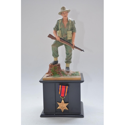 463 - Danbury Mint Jungle Raider The British Chindit, painted resin figurine on plinth with replica Burma ... 