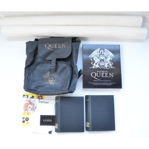 531 - Collection of Queen memorabilia to include two A5 albums containing Official Queen fan club magazine... 