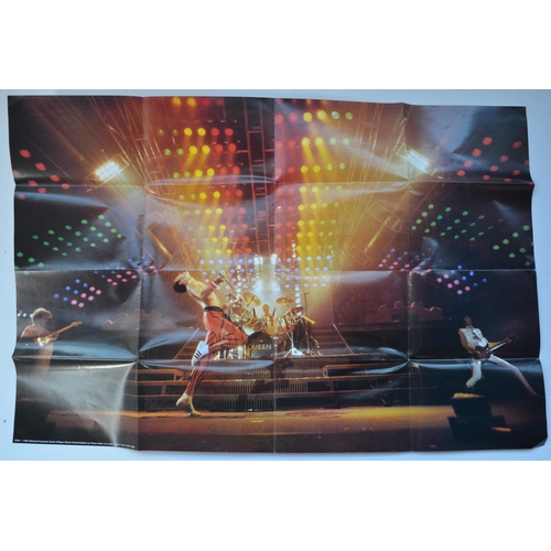 531 - Collection of Queen memorabilia to include two A5 albums containing Official Queen fan club magazine... 