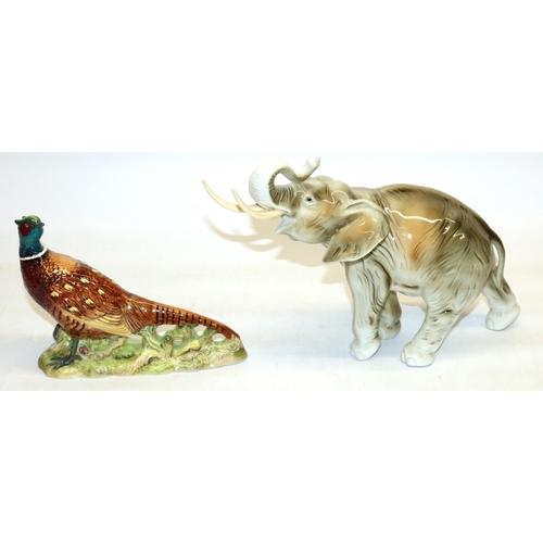 104 - Royal Dux African Bull Elephant with makers mark and impressed number 3782 61, H21cm and a Beswick c... 