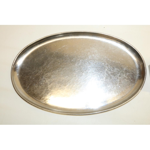 295 - Keswick School of Industrial Art oval tray, spot hammered, marked Firth Staybrite, L41cm, and a Piet... 