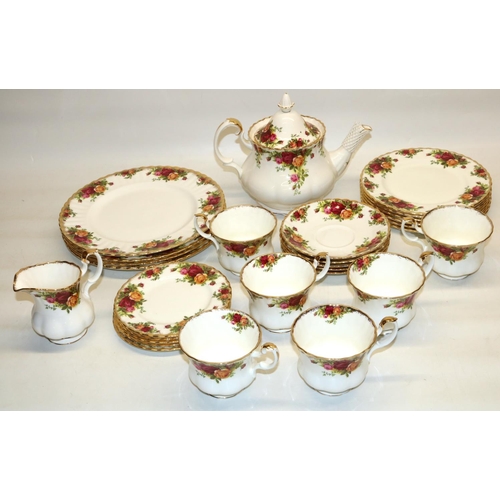 431 - Royal Albert Old Country Roses tea and dinner ware, comprising teapot H19cm, four 26.5cm dinner plat... 