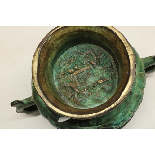 434 - Chinese verdigris bronze archaic style two-handled censer, H8.5cm, lacking cover, and a Persian bras... 