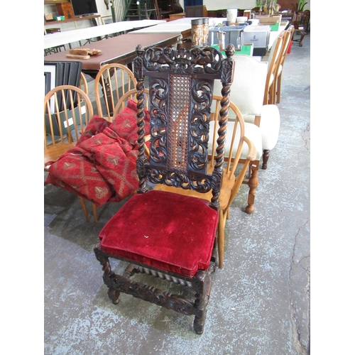 912 - C17th style oak dining chair, with scroll carved and bergere panel back and seat on barley twist and... 