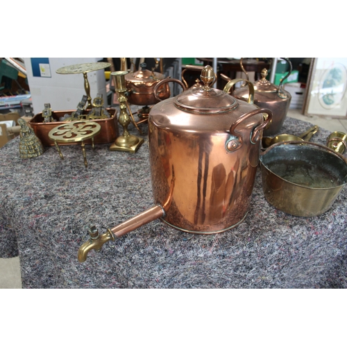 1053 - Large collection of copper and brass ware including copper kettles, kettle heater, jam pan, brass la... 