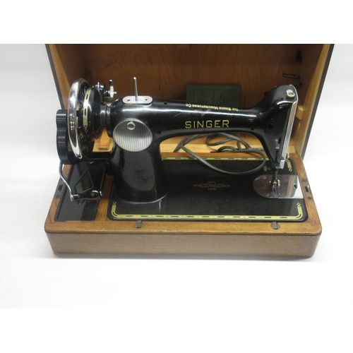 332 - Cased Singer sewing machine