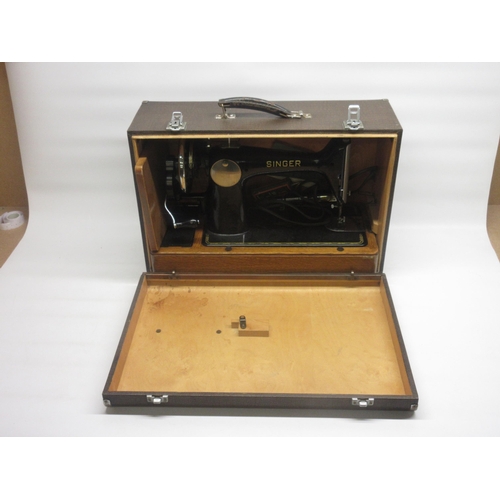 332 - Cased Singer sewing machine