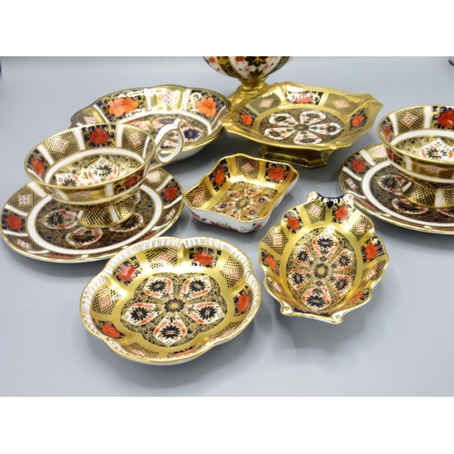 344 - Royal Crown Derby Imari 1128 jug, 3 pin trays, 2 cups and saucers, etc. (10)