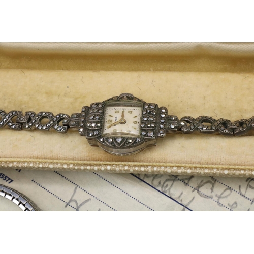 372 - Ladies Premex handwound cocktail watch in plated case set with marcasite, snap off stainless steel b... 