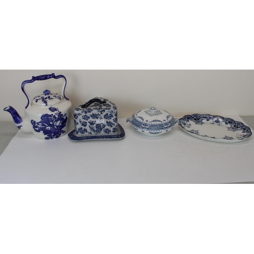 294 - Large blue and white decorated teapot, similar cheese dish and cover, a Cornwall pattern oval dish a... 