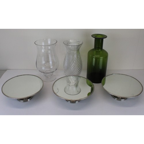 270 - Three polished metal tazza with mirror plate tops D26cm, a hand blown clear glass vase and two other... 