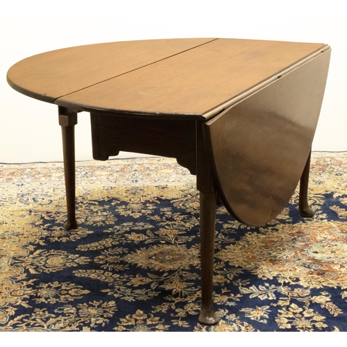 810 - Geo.III mahogany gateleg table, oval top with fall leaves on turned supports with pad feet, W126cm D... 