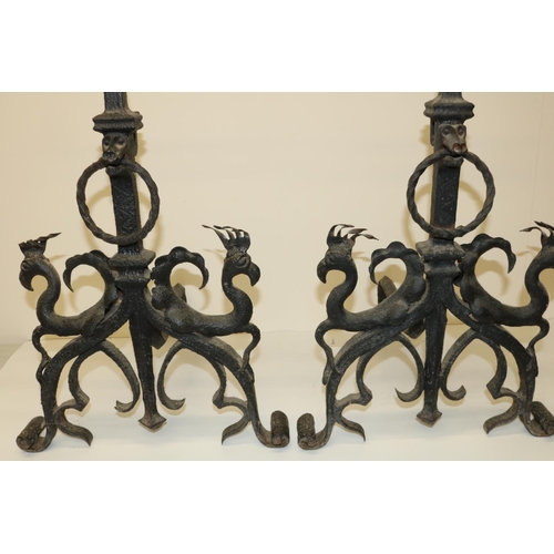 850 - The Lizzie Cundy Collection - Pair 19th Century style wrought iron fire dogs, with integrated candle... 