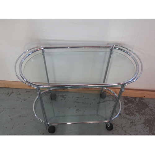 673 - Art Deco style chrome drinks cart with two glass shelves, W80cm D36cm H65cm