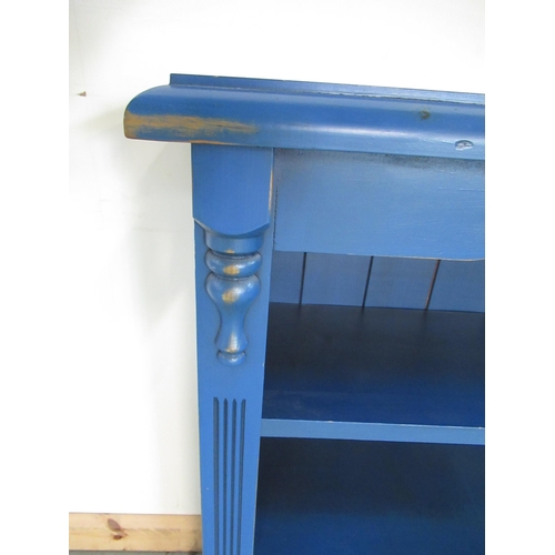 791 - Vintage blue painted low open bookcase with two adjustable shelves on plinth base, W135cm D28cm H90c... 