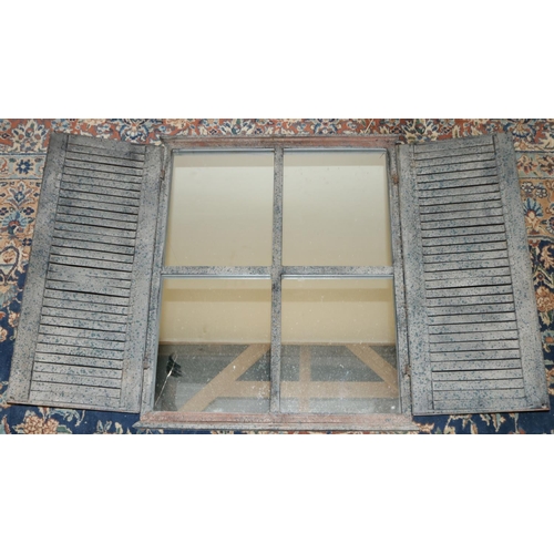 293 - Distressed metal framed mirror, enclosed by a pair of louvre doors, W107cm H72cm