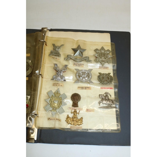 551 - Collection of military badges in 2 folders inc. the Tyneside Scottish, the Seaford 5th Battalion, Ro... 