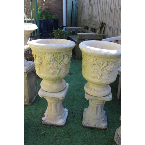 1010 - pair of garden planters with floral and leaf design on plinth H83cm (2)