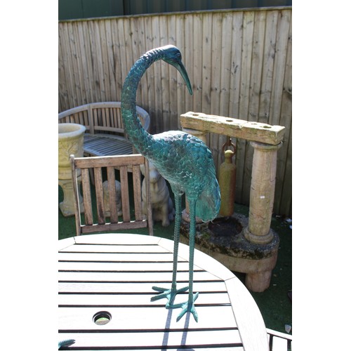 1006 - pair of well cast metal cranes painted with a bronzed effect green H100cm