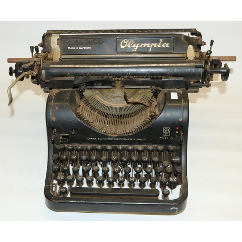 124 - Olympia model 8 typewriter in japanned metal finish