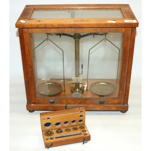 152 - Philip Harris Ltd Birmingham Analytical Brass Chemical Balance in stained beech cabinet complete wit... 