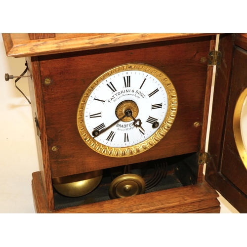 157 - Fattorini & Sons early C20th oak cased patent automatic alarm clock with signed enamel dial and regi... 