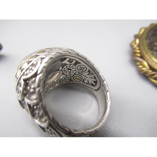 211 - silver Chinese style ring set with oval cloudy white stone, with 18ct gold detail, stamped 925 18k, ... 