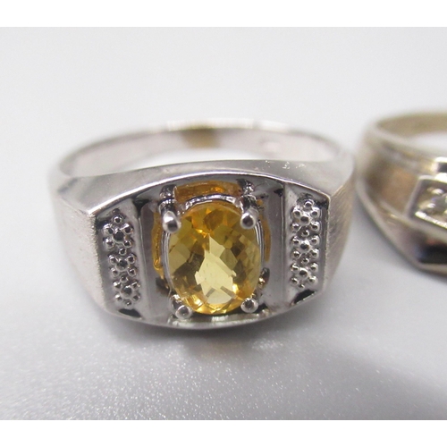 220 - 10ct white gold ring set with oval cut citrine, stamped 10k, size T1/2, and another 10k white gold r... 