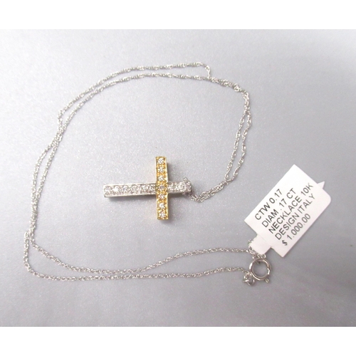 221 - Yellow and white metal crucifix pendant set with diamonds, no hallmark, on 10ct white gold chain, st... 