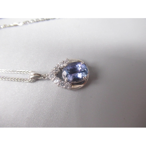 222 - Hallmarked Sterling silver necklace with oval cut light blue stone surrounded by clear stones, and a... 