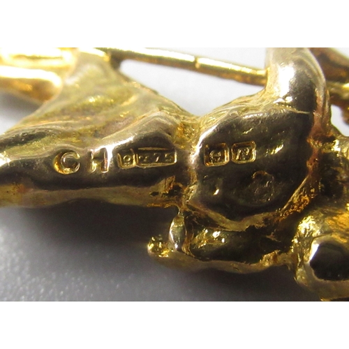 27 - Two 9ct yellow gold charms, including St. Christopher, and Moses, both stamped 375, 9.7g