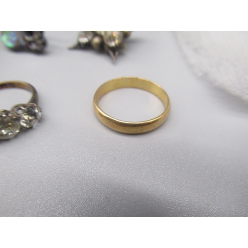49 - 9ct gold and silver ring set with three clear stones, a yellow metal wedding band with no hallmarks,... 